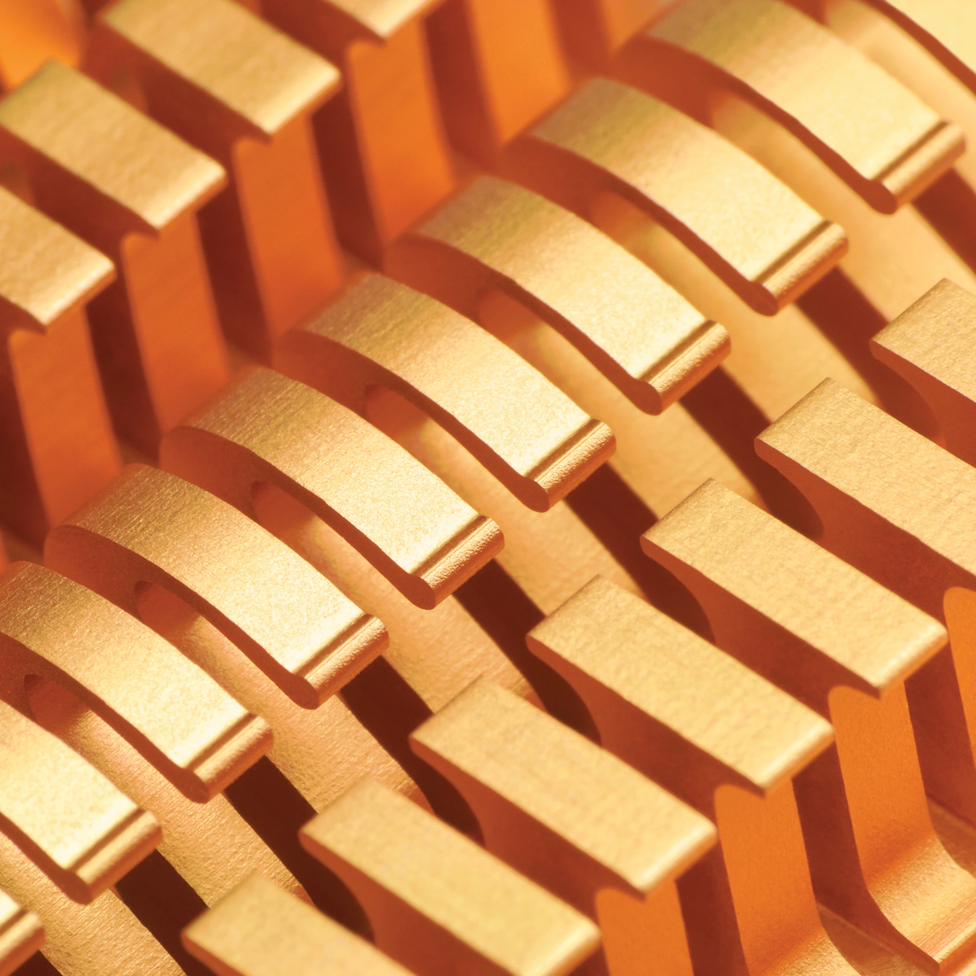 Macro photograph of a copper cooling structure used to dissipate heat from computing hardware.